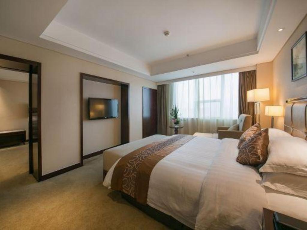 Maison New Century Hotel Ningbo Extérieur photo