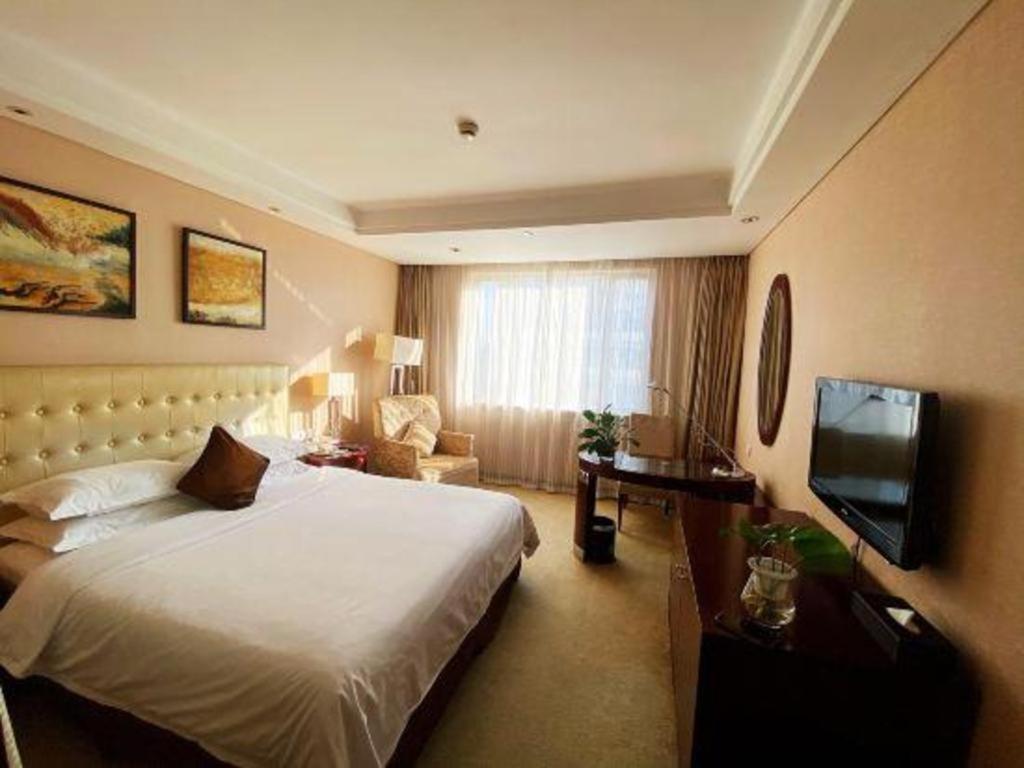 Maison New Century Hotel Ningbo Extérieur photo