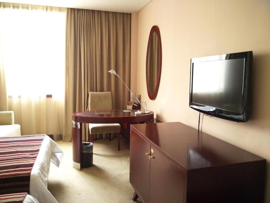 Maison New Century Hotel Ningbo Extérieur photo