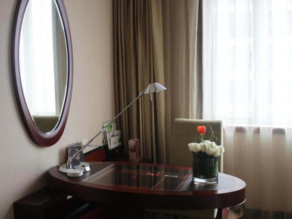Maison New Century Hotel Ningbo Extérieur photo
