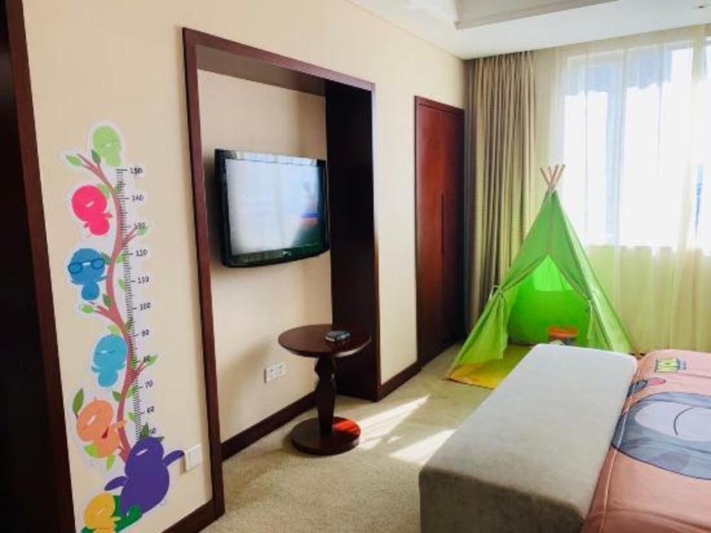 Maison New Century Hotel Ningbo Extérieur photo
