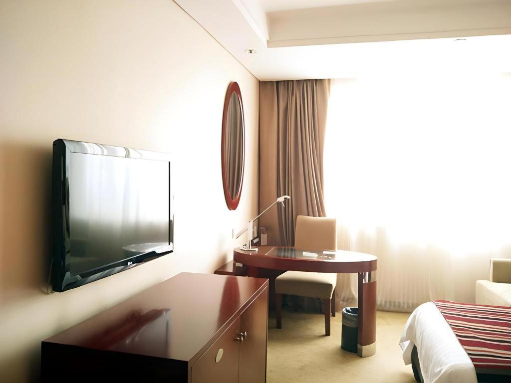 Maison New Century Hotel Ningbo Extérieur photo